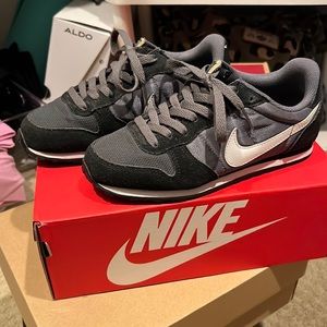 Black and grey Nikes